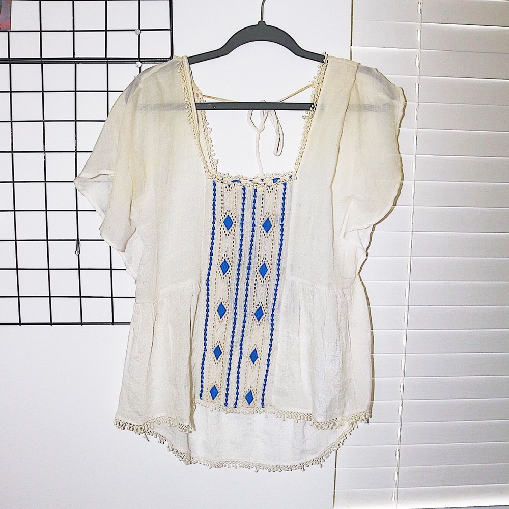 high/ low detail blouse